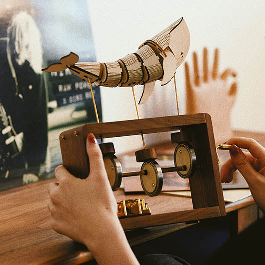 Rompecabezas mecánico de ballena de 92 piezas con caja de música para regalar y decorar.