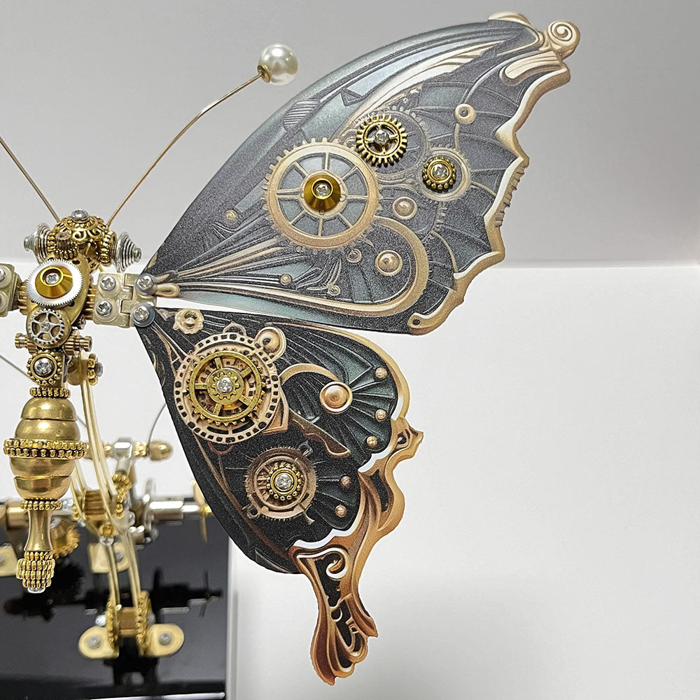 Modelo de rompecabezas de metal de mariposa steampunk mecánico con caja de música