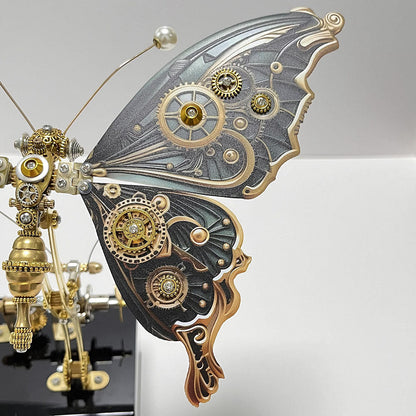 Modelo de rompecabezas de metal de mariposa steampunk mecánico con caja de música