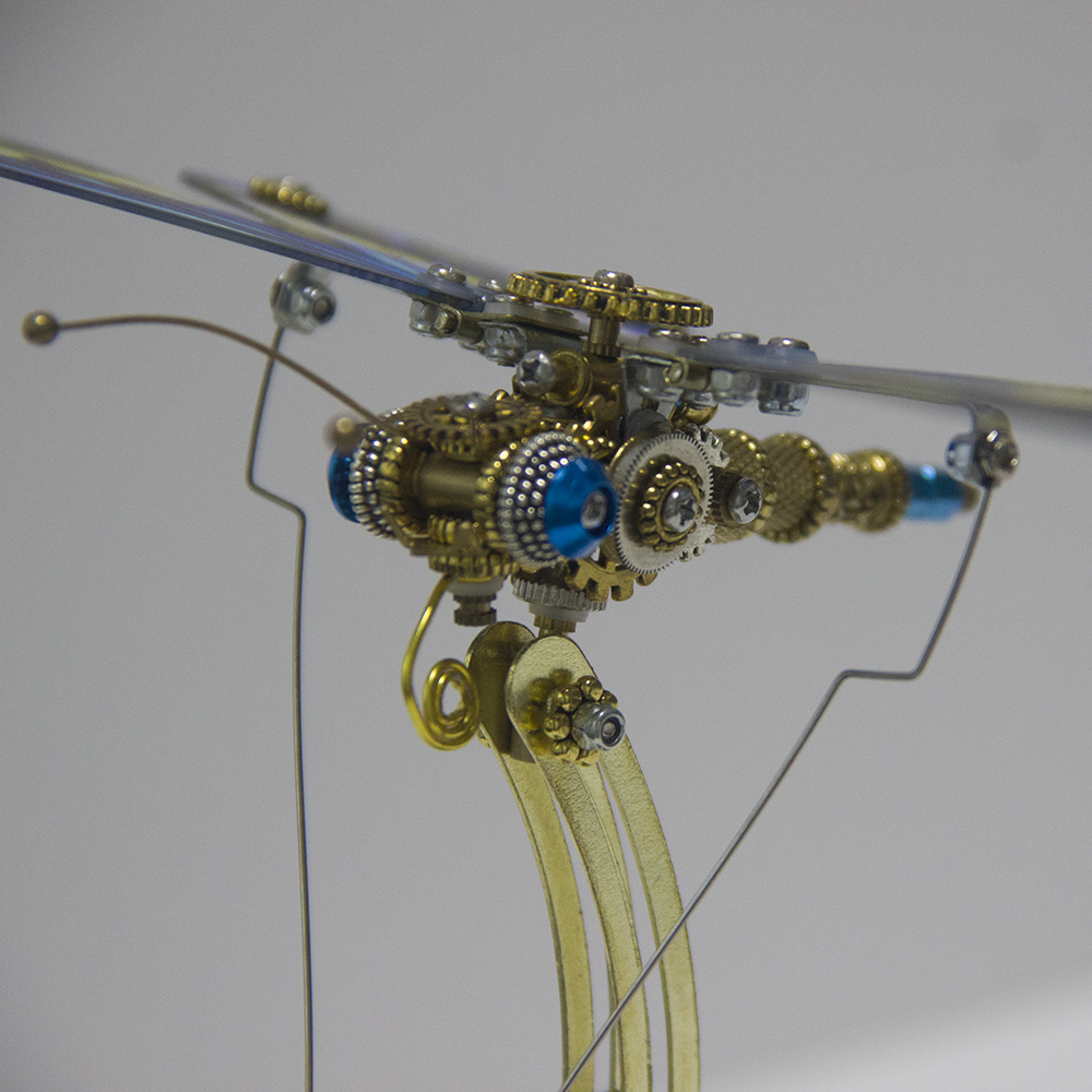 Rompecabezas mecánico de metal Steampunk con diseño de mariposa y caja de música.